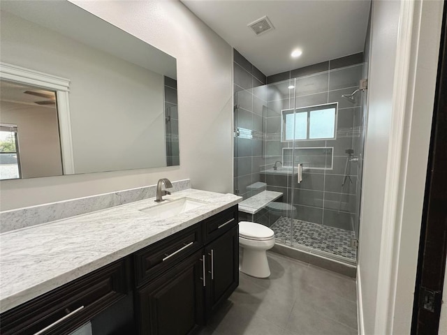 7737 Brookside Rd, Pearland, TX 77581 - full bath featuring vanity, toilet, a shower stall, and healthy amount of natural light