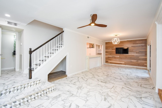 201 Vanderpool Ln Unit 27, Houston, TX 77024 - unfurnished living room with wooden walls, stairway, a ceiling fan, crown molding, and marble finish floors