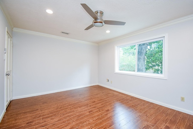 201 Vanderpool Ln Unit 27, Houston, TX 77024 - spare room with wood finished floors, ornamental molding, ceiling fan, baseboards, and a textured ceiling