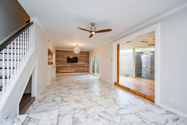 201 Vanderpool Ln Unit 27, Houston, TX 77024 - unfurnished living room featuring a ceiling fan, ornamental molding, wooden walls, marble finish flooring, and stairs