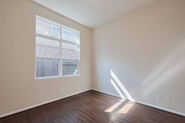 13513 Palo Lake Ln, Houston, TX 77044 - spare room featuring dark wood-style floors and baseboards