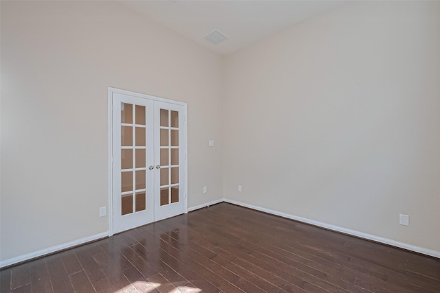 13513 Palo Lake Ln, Houston, TX 77044 - spare room with french doors, dark wood-style flooring, and baseboards