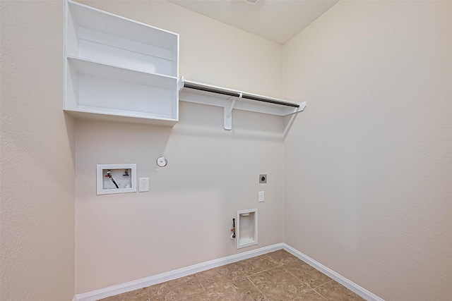 13513 Palo Lake Ln, Houston, TX 77044 - laundry room featuring gas dryer hookup, electric dryer hookup, hookup for a washing machine, baseboards, and tile patterned flooring