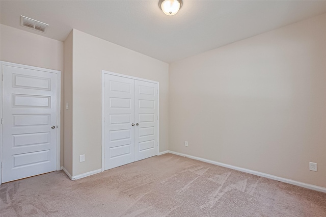 13513 Palo Lake Ln, Houston, TX 77044 - unfurnished bedroom with carpet, a closet, and baseboards