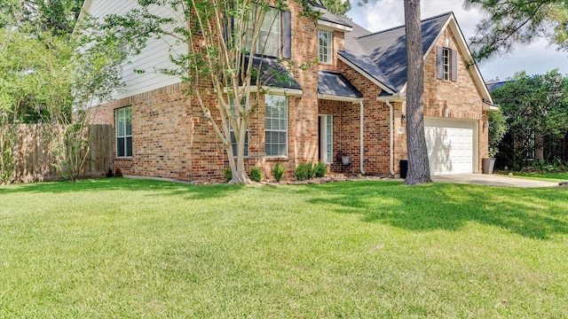 20703 Emerald Spruce Ct, Kingwood, TX 77346 - view of front of property featuring brick siding, a garage, and a shingled roof
