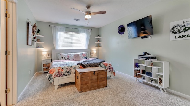 20703 Emerald Spruce Ct, Kingwood, TX 77346 - bedroom with light colored carpet, baseboards, and ceiling fan