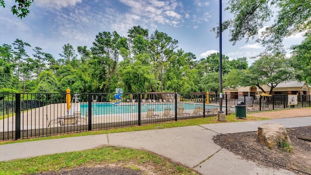 20703 Emerald Spruce Ct, Kingwood, TX 77346 - community pool with view of wooded area