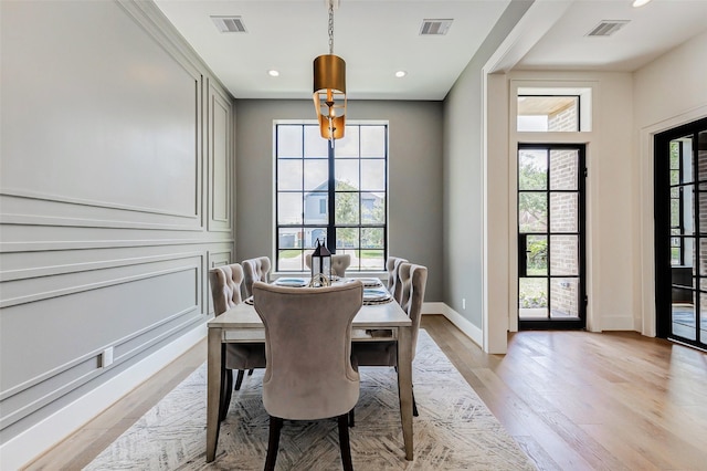 1810 Woodcrest Dr, Houston, TX 77018 - dining area featuring plenty of natural light, light wood finished floors, baseboards, and recessed lighting