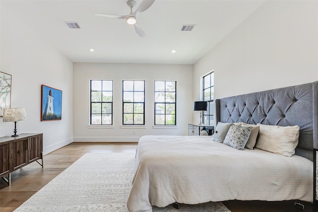1810 Woodcrest Dr, Houston, TX 77018 - bedroom featuring wood finished floors, baseboards, recessed lighting, and ceiling fan