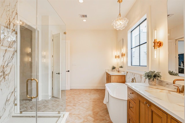 1810 Woodcrest Dr, Houston, TX 77018 - bathroom with two vanities, a freestanding bath, a shower stall, a chandelier, and baseboards