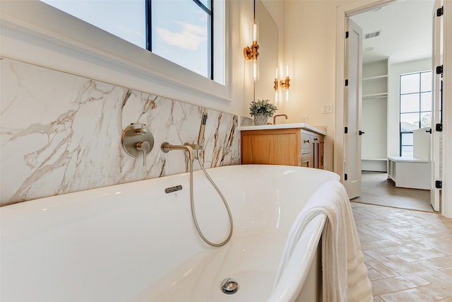 1810 Woodcrest Dr, Houston, TX 77018 - bathroom featuring a freestanding bath and vanity