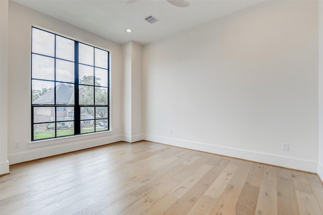 1810 Woodcrest Dr, Houston, TX 77018 - unfurnished room with baseboards, light wood-style floors, and recessed lighting