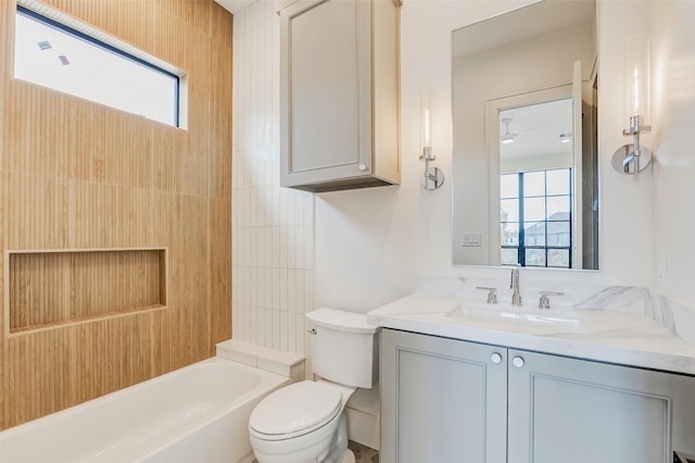 1810 Woodcrest Dr, Houston, TX 77018 - full bath with toilet, healthy amount of natural light, vanity, and bathing tub / shower combination