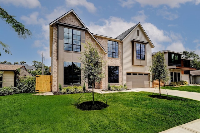 1810 Woodcrest Dr, Houston, TX 77018 - view of front of house with a garage, driveway, and brick siding