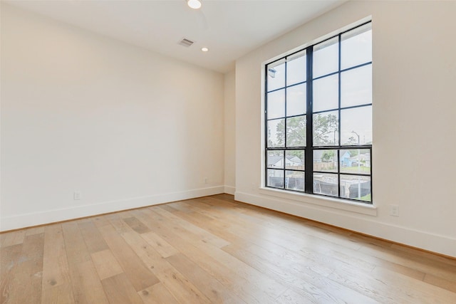 1810 Woodcrest Dr, Houston, TX 77018 - spare room featuring light wood finished floors, baseboards, and recessed lighting