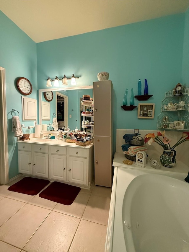 20122 Yellow Canyon Falls Dr, Tomball, TX 77375 - bathroom with tile patterned flooring, vanity, and a tub to relax in