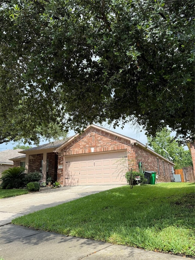 20122 Yellow Canyon Falls Dr, Tomball, TX 77375 - ranch-style home with brick siding, an attached garage, and concrete driveway