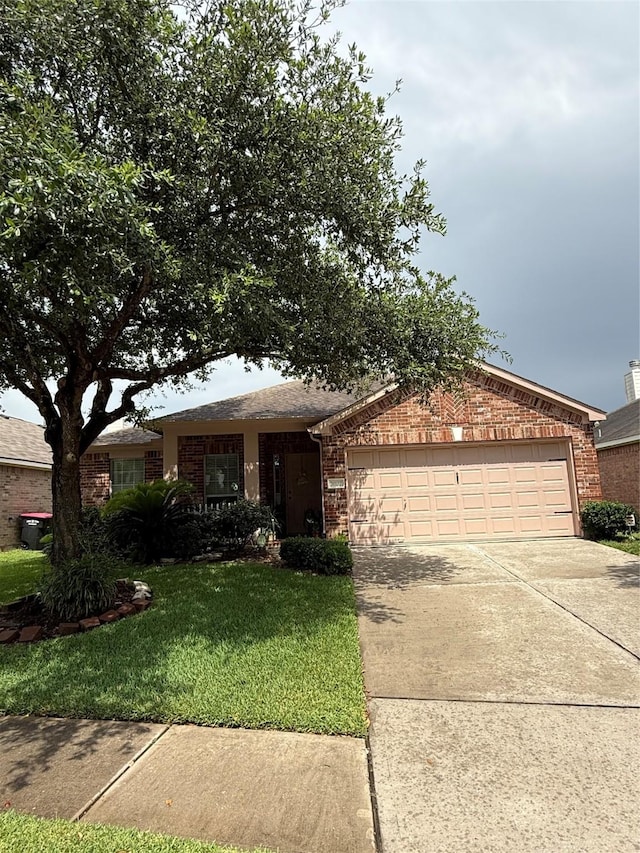 20122 Yellow Canyon Falls Dr, Tomball, TX 77375 - single story home featuring brick siding, a garage, driveway, and a front lawn