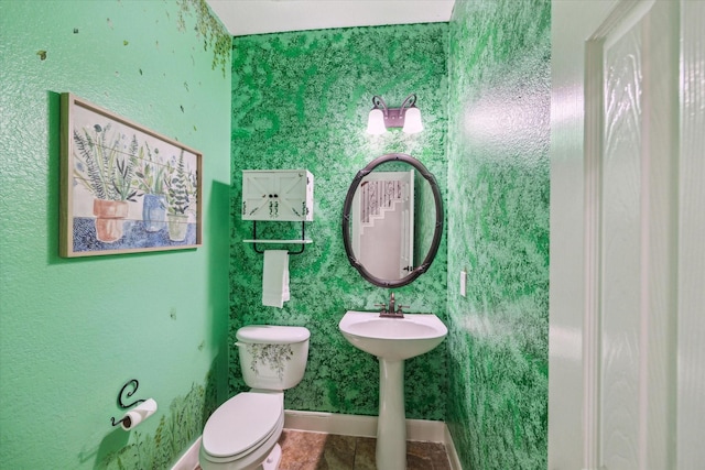 15718 Starcreek Ln, Houston, TX 77044 - bathroom featuring toilet, baseboards, and tile patterned floors