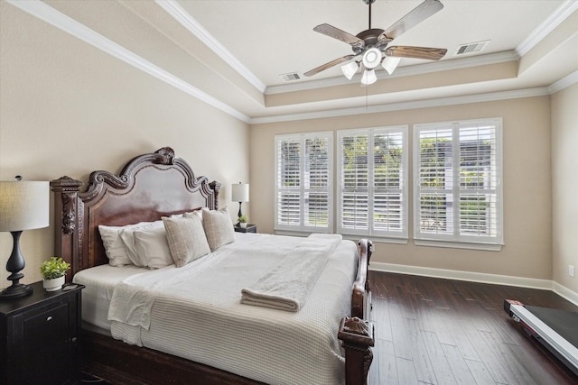 15718 Starcreek Ln, Houston, TX 77044 - bedroom featuring a raised ceiling, hardwood / wood-style flooring, baseboards, crown molding, and a ceiling fan