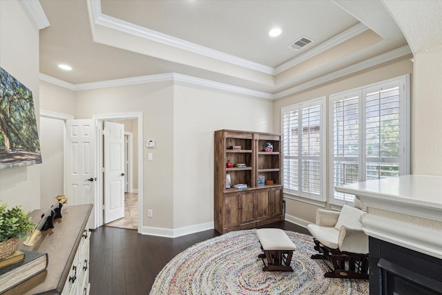 15718 Starcreek Ln, Houston, TX 77044 - sitting room featuring crown molding, dark wood-style floors, a raised ceiling, recessed lighting, and baseboards