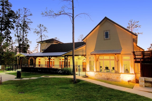 15718 Starcreek Ln, Houston, TX 77044 - rear view of property with metal roof and a standing seam roof
