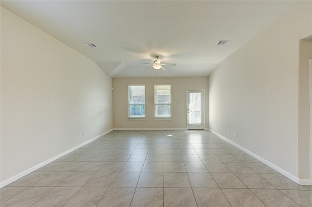 6531 Cody Mountain Trl, Richmond, TX 77407 - spare room with a ceiling fan, light tile patterned floors, and baseboards