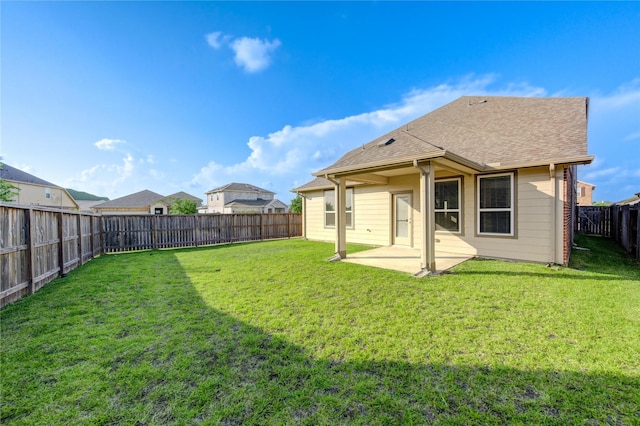 6531 Cody Mountain Trl, Richmond, TX 77407 - back of property with a patio and a shingled roof