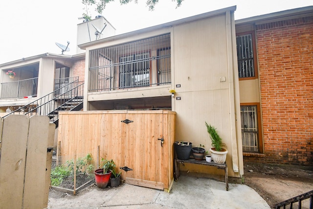 10100 S Gessner Rd Unit 308, Houston, TX 77071 - view of side of home with brick siding