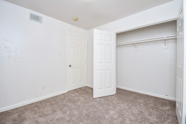 10100 S Gessner Rd Unit 308, Houston, TX 77071 - unfurnished bedroom featuring carpet flooring, baseboards, and a closet