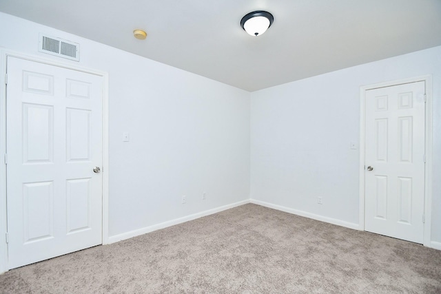 10100 S Gessner Rd Unit 308, Houston, TX 77071 - carpeted spare room with baseboards and a smoke detector