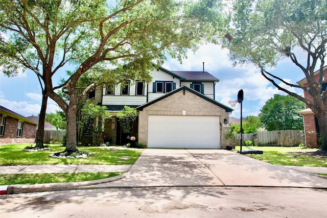2206 Rocky Hollow Ln, Katy, TX 77450 - traditional home with concrete driveway and an attached garage