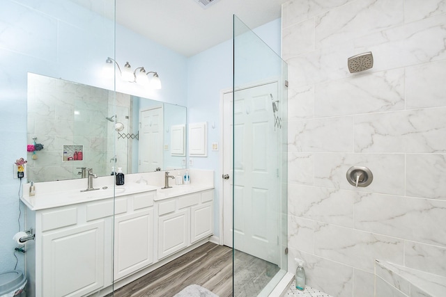 2206 Rocky Hollow Ln, Katy, TX 77450 - full bath featuring walk in shower, double vanity, and wood finished floors