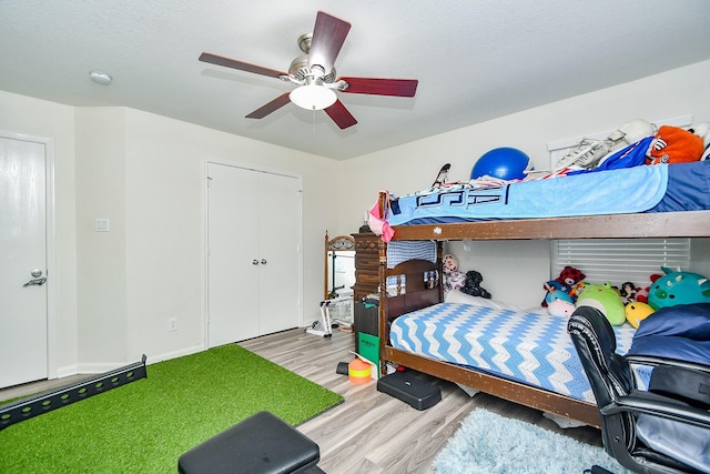 2206 Rocky Hollow Ln, Katy, TX 77450 - bedroom featuring wood finished floors and ceiling fan