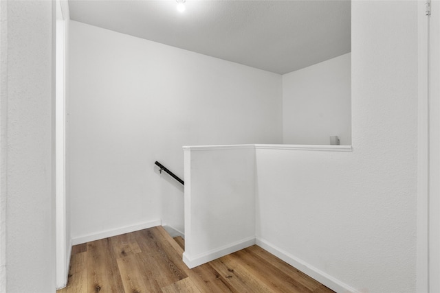 6500 Sands Point Dr Unit 107, Houston, TX 77074 - stairs with wood finished floors and baseboards