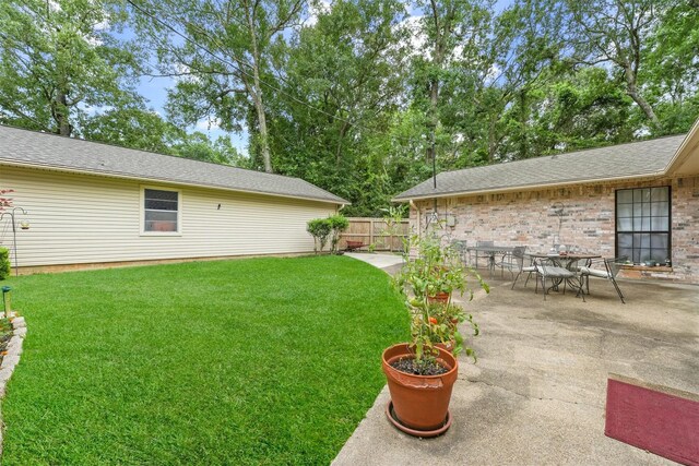 103 Whippoorwill Dr, Livingston, TX 77351 - view of yard with a patio area
