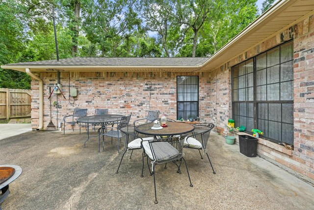 103 Whippoorwill Dr, Livingston, TX 77351 - view of patio with outdoor dining space
