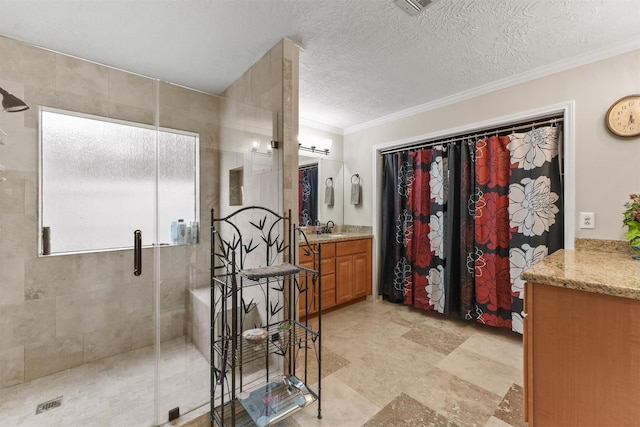103 Whippoorwill Dr, Livingston, TX 77351 - bathroom with a shower stall, vanity, crown molding, and a textured ceiling