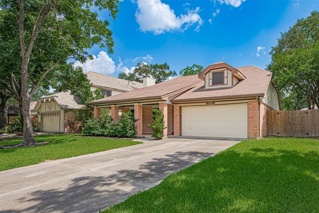 19426 Gladewater Dr, Tomball, TX 77375 - view of front of property featuring brick siding, a garage, driveway, a chimney, and roof with shingles
