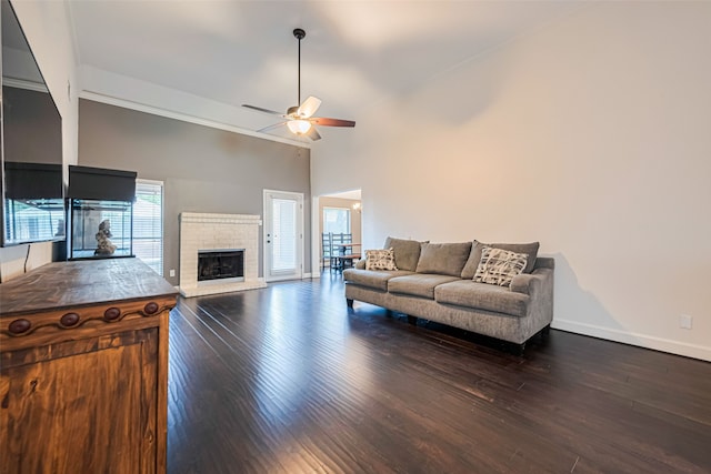 19426 Gladewater Dr, Tomball, TX 77375 - living room featuring a fireplace, a ceiling fan, wood finished floors, and baseboards