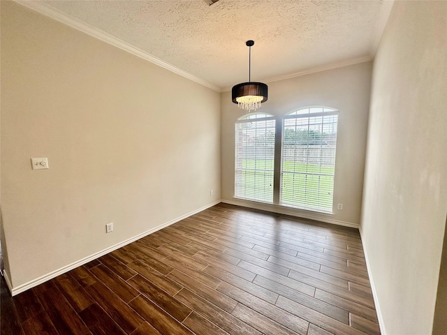 5035 Chappel Hill Dr, Missouri City, TX 77459 - spare room featuring dark wood-style floors, a textured ceiling, baseboards, ornamental molding, and a chandelier
