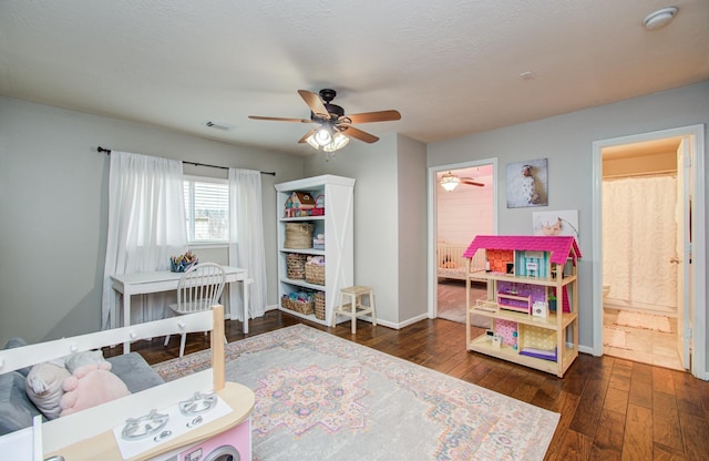 1918 Hollow Mist Ln, Pearland, TX 77581 - bedroom with hardwood / wood-style floors, baseboards, ensuite bath, and ceiling fan