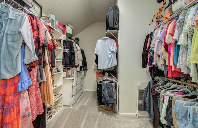 1918 Hollow Mist Ln, Pearland, TX 77581 - walk in closet featuring vaulted ceiling and carpet flooring