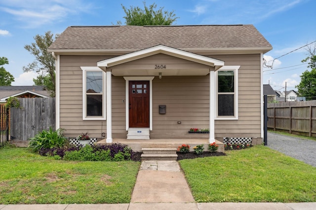 2604 Cochran St, Houston, TX 77009 - bungalow-style house featuring a shingled roof
