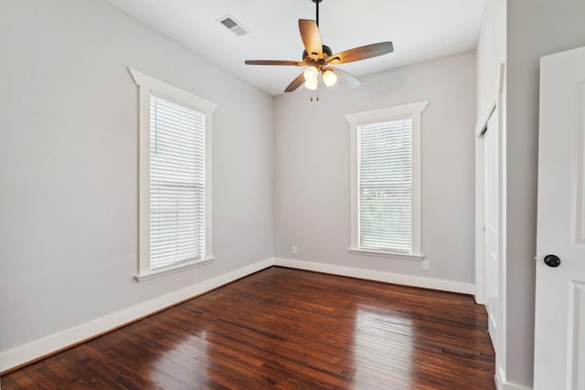 2604 Cochran St, Houston, TX 77009 - empty room featuring a ceiling fan, hardwood / wood-style flooring, and baseboards