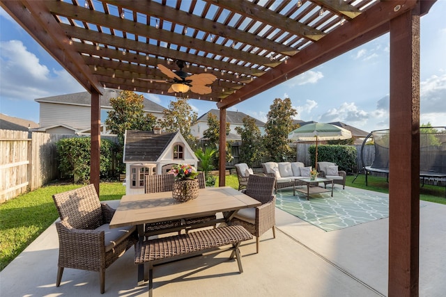 18731 Pilot Knolls Dr, Cypress, TX 77433 - view of patio with a trampoline, a pergola, outdoor dining area, and an outdoor living space