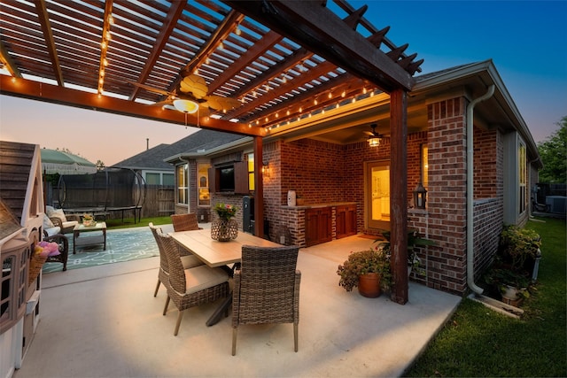 18731 Pilot Knolls Dr, Cypress, TX 77433 - view of patio / terrace featuring a trampoline, a pergola, outdoor dining area, and ceiling fan