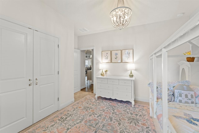 18731 Pilot Knolls Dr, Cypress, TX 77433 - bedroom with baseboards and a chandelier