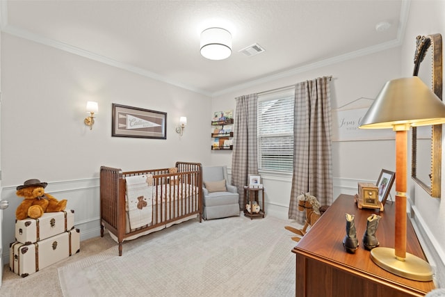 18731 Pilot Knolls Dr, Cypress, TX 77433 - carpeted bedroom with crown molding, a nursery area, and wainscoting
