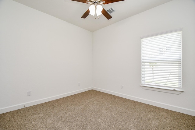 6718 Utah St, Houston, TX 77091 - unfurnished room with light carpet, ceiling fan, baseboards, and lofted ceiling
